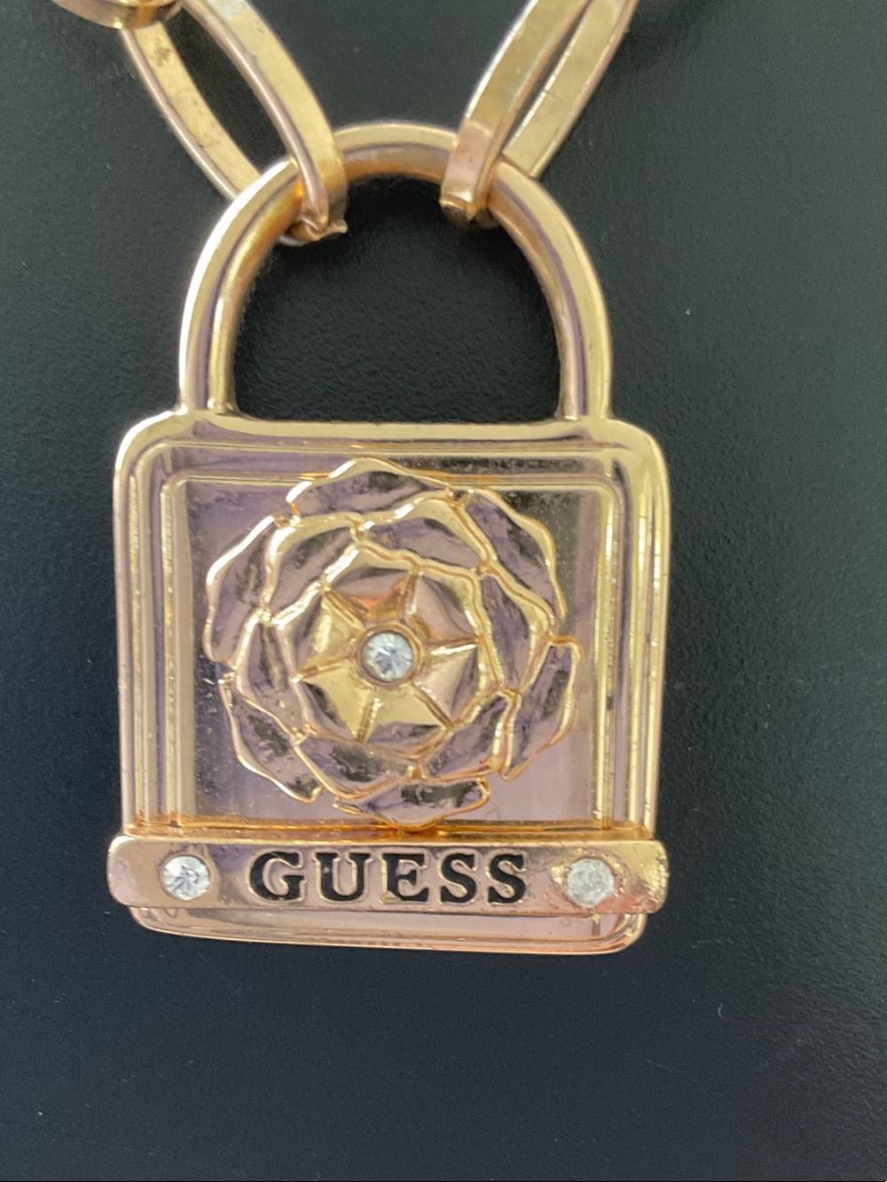 GUESS Gold Padlock Pendant with Floral Accent